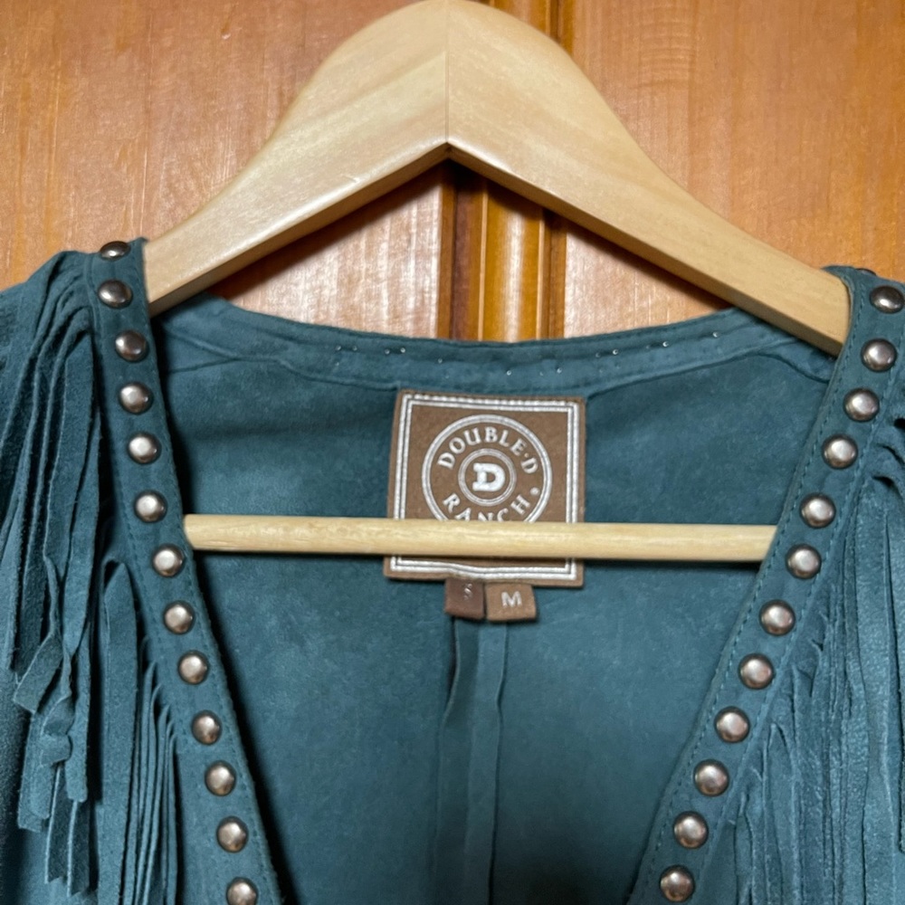 Double D Ranchwear Turquoise Suede Poncho with fringe and conchos.